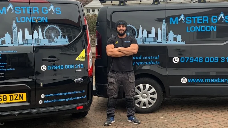 Master Gas London home page with image of an engineer with vans